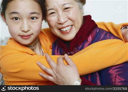 Portrait of a daughter hugging her mother