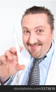 Portrait of a doctor with a syringe