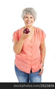 Portrait of a elderly woman eating a red apple