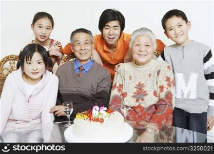 Portrait of a family at a birthday party