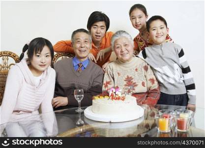 Portrait of a family at a birthday party