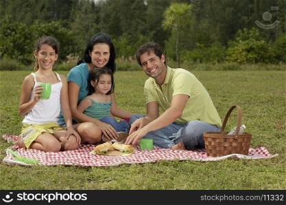 Portrait of a family at a picnic