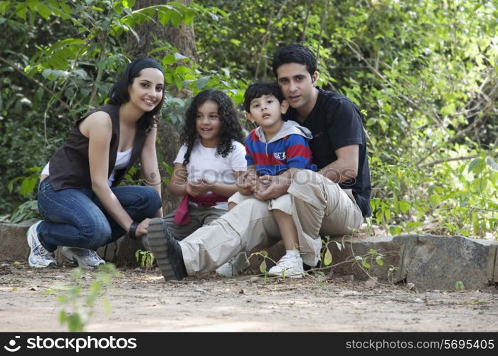 Portrait of a family in a park