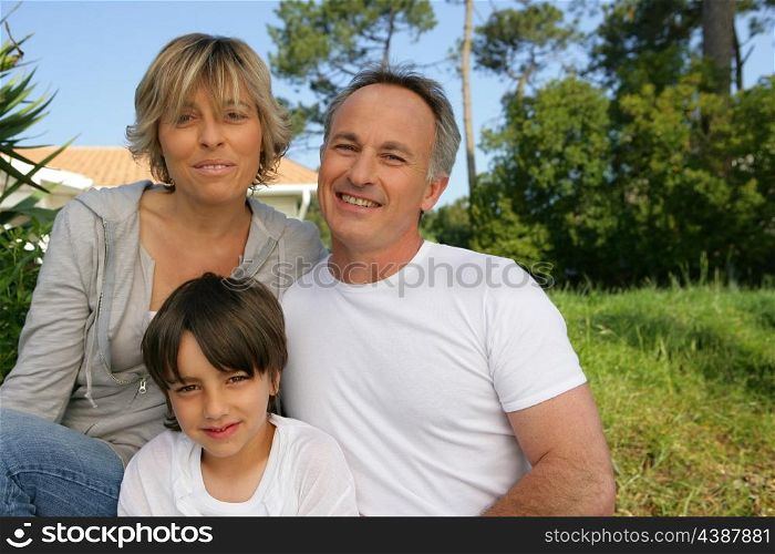 Portrait of a family in their garden