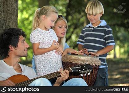 portrait of a family playing music