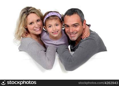 Portrait of a family sitting on a sofa