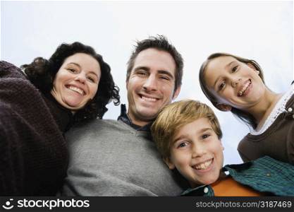 Portrait of a family smiling