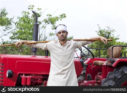 Portrait of a farmer with a stick