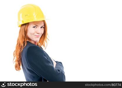 Portrait of a female architect in a yellow helmet, space on the right on a white background