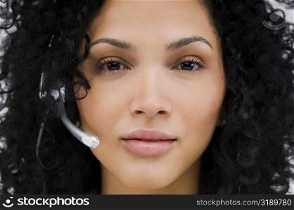 Portrait of a female customer service representative wearing a headset
