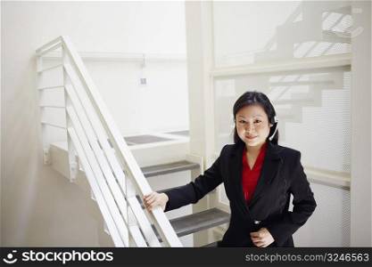Portrait of a female customer service representative wearing a headset and smiling