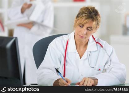 portrait of a female doctor standing in the hospital