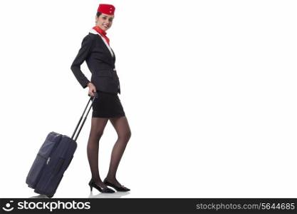 Portrait of a flight attendant with luggage bag isolated over white background