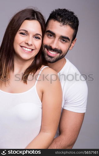 Portrait of a funny love couple hugging each other