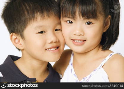 Portrait of a girl and her brother