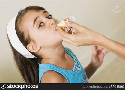 Portrait of a girl eating
