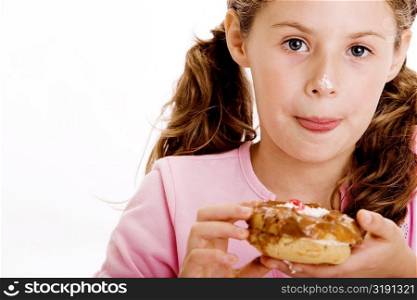Portrait of a girl eating dessert