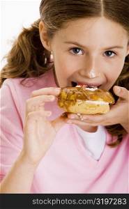 Portrait of a girl eating dessert