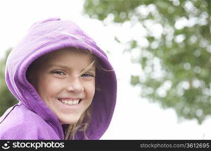 Portrait of a girl in a purple hooded top