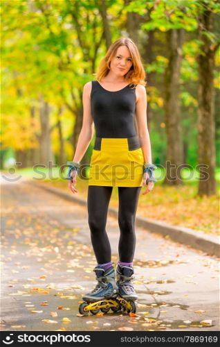 portrait of a girl in a yellow skirt roller skate