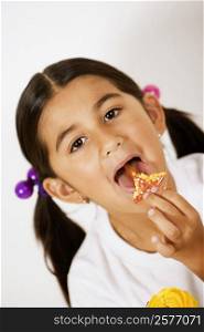 Portrait of a girl licking a candy