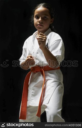 Portrait of a girl practicing karate