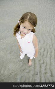 Portrait of a girl standing on the beach