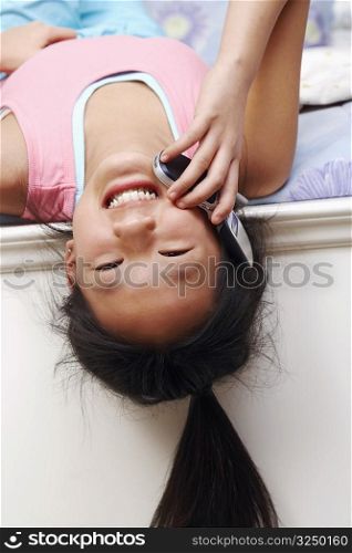 Portrait of a girl talking on a mobile phone