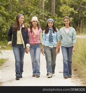 Portrait of a girl walking with her friends