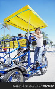 Portrait of a girl with a boy on a buggy