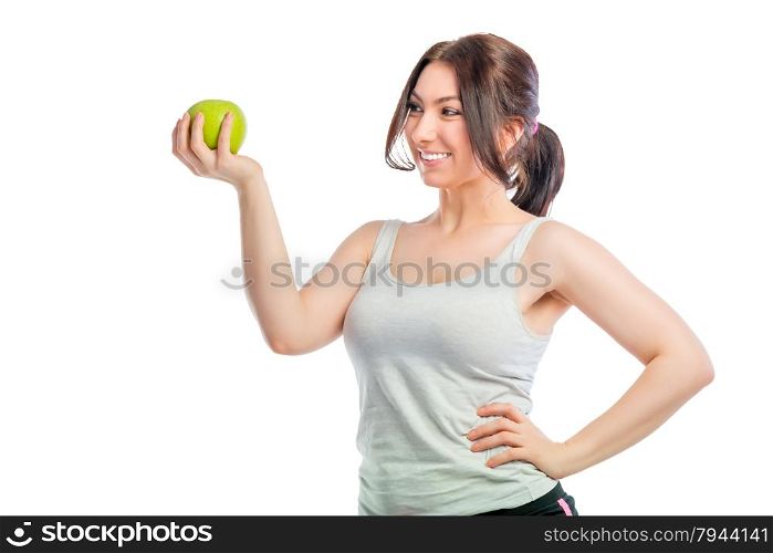 portrait of a girl with a green apple on a white background