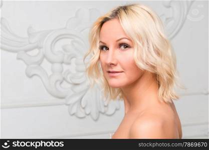 portrait of a girl with good skin on a white background