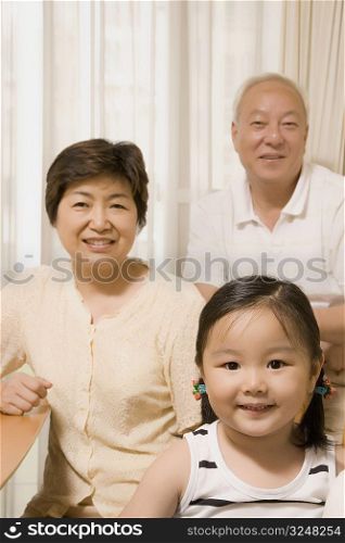 Portrait of a girl with her grandparents
