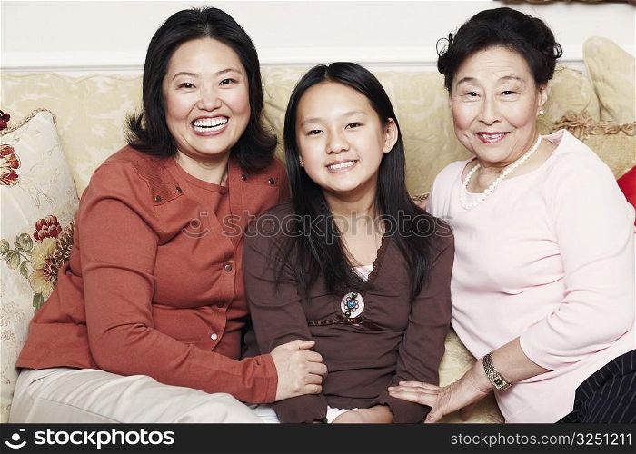 Portrait of a girl with her mother and her grandmother