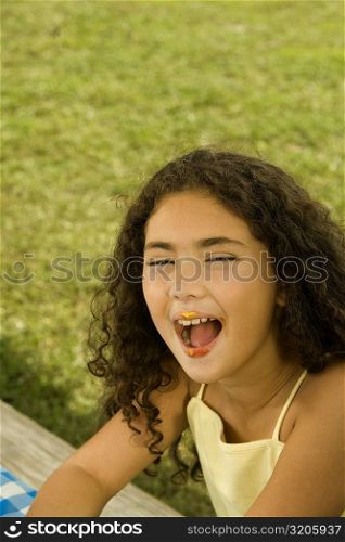 Portrait of a girl with her mouth open