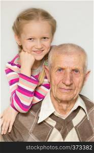 portrait of a granddaughter and grandfather, close-up