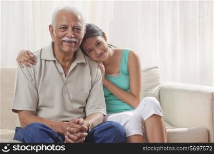 Portrait of a grandfather and granddaughter