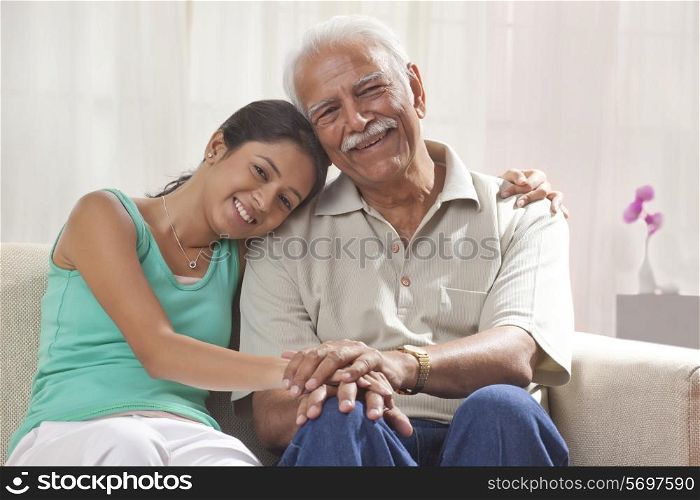 Portrait of a grandfather and granddaughter