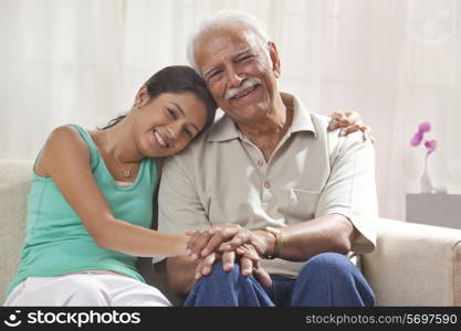 Portrait of a grandfather and granddaughter