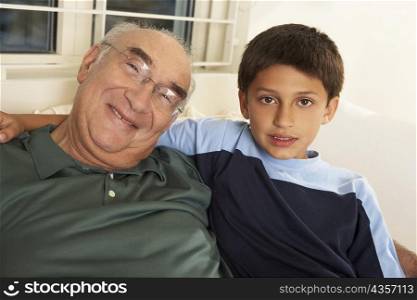Portrait of a grandfather smiling with his grandson