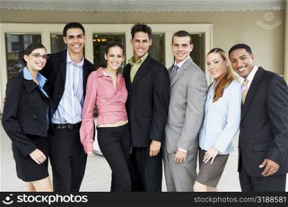 Portrait of a group of business executives standing