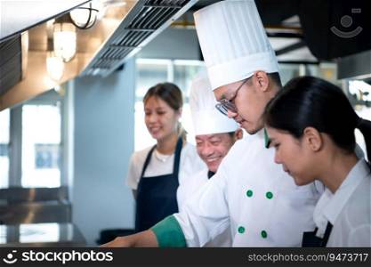 Portrait of a group of chefs and culinary students in the culinary Institute’s kitchen.