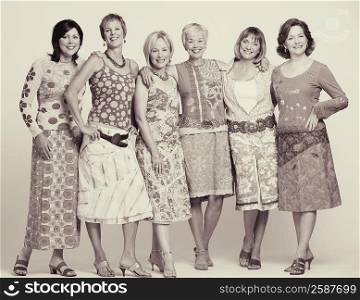 Portrait of a group of mature women standing and smiling