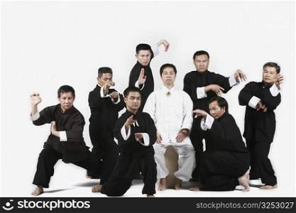 Portrait of a group of people practicing martial arts