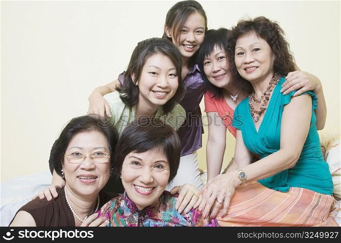 Portrait of a group of women posing and smiling