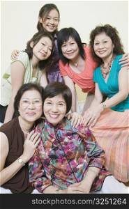 Portrait of a group of women posing and smiling