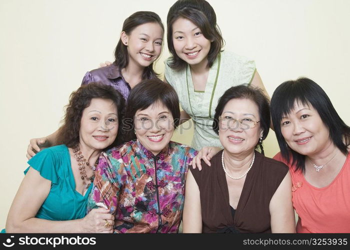 Portrait of a group of women posing and smiling