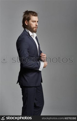 Portrait of a handsome guy wearing suit