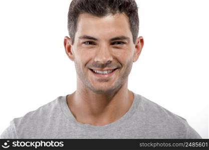 Portrait of a handsome latin man smiling, isolated over a white background. Handsome man
