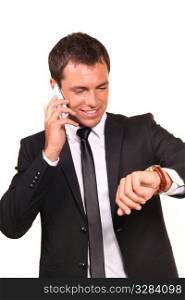 Portrait of a handsome young business man on cell phone.